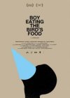 BOY EATING BIRD'S FOOD