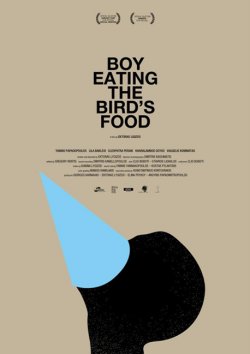BOY EATING THE BIRD'S FOOD