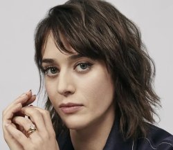 LIZZY CAPLAN