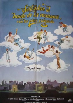 SENTADOS AL BODE DE LA MAÑANA CON LOS PIES COLGANDO